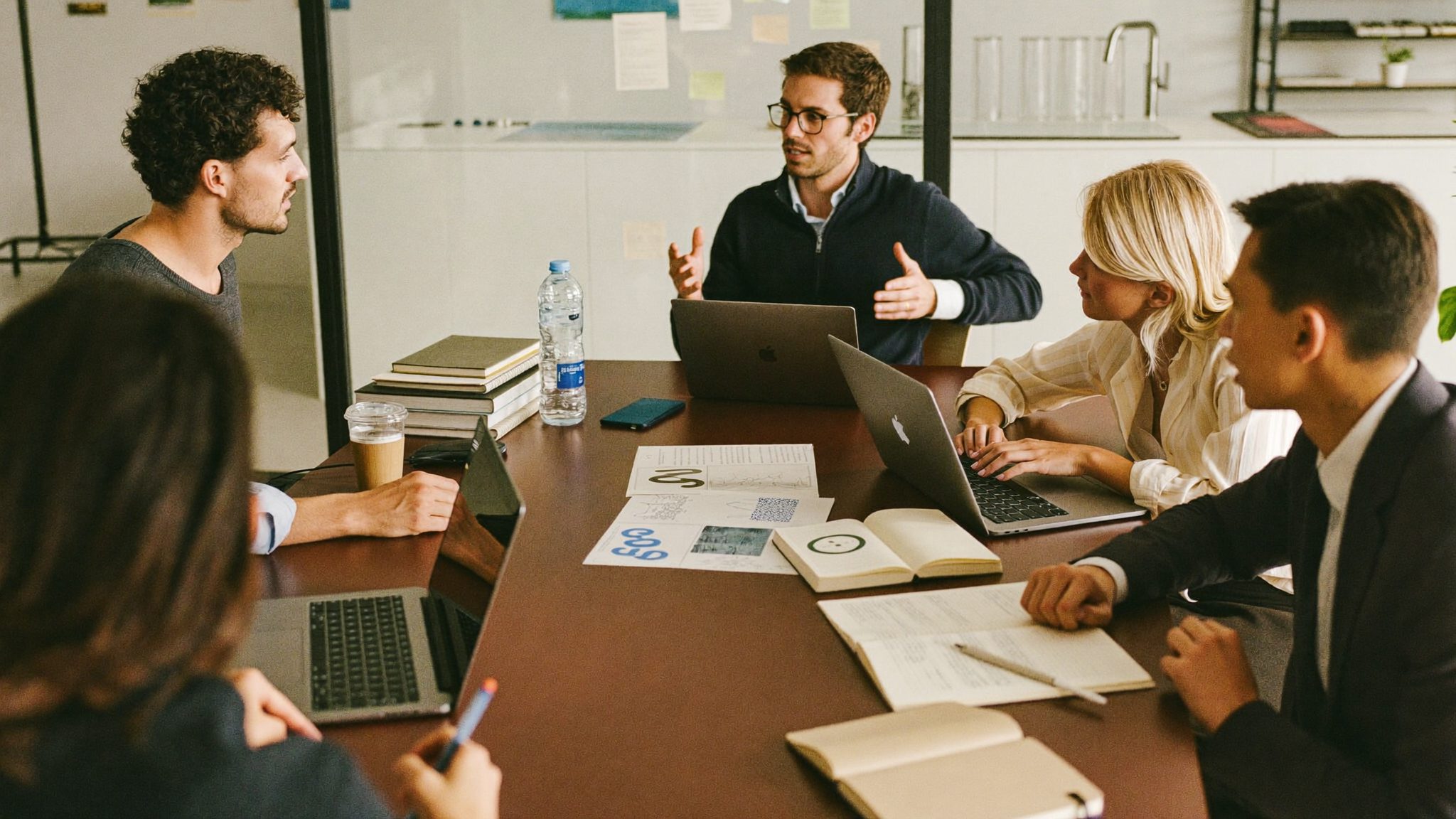 Advisors in a strategic planning session around a boardroom table